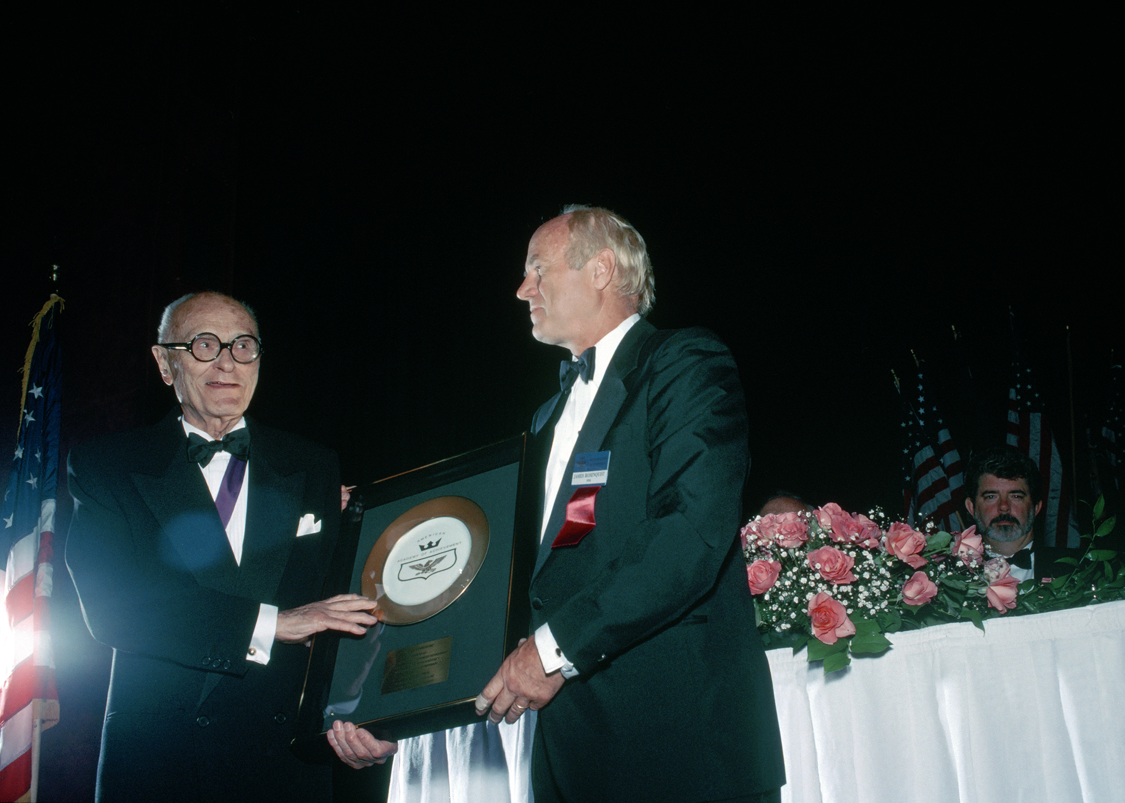 James Rosenquist presents the Academy's Golden Plate Award to architect Philip C. Johnson.