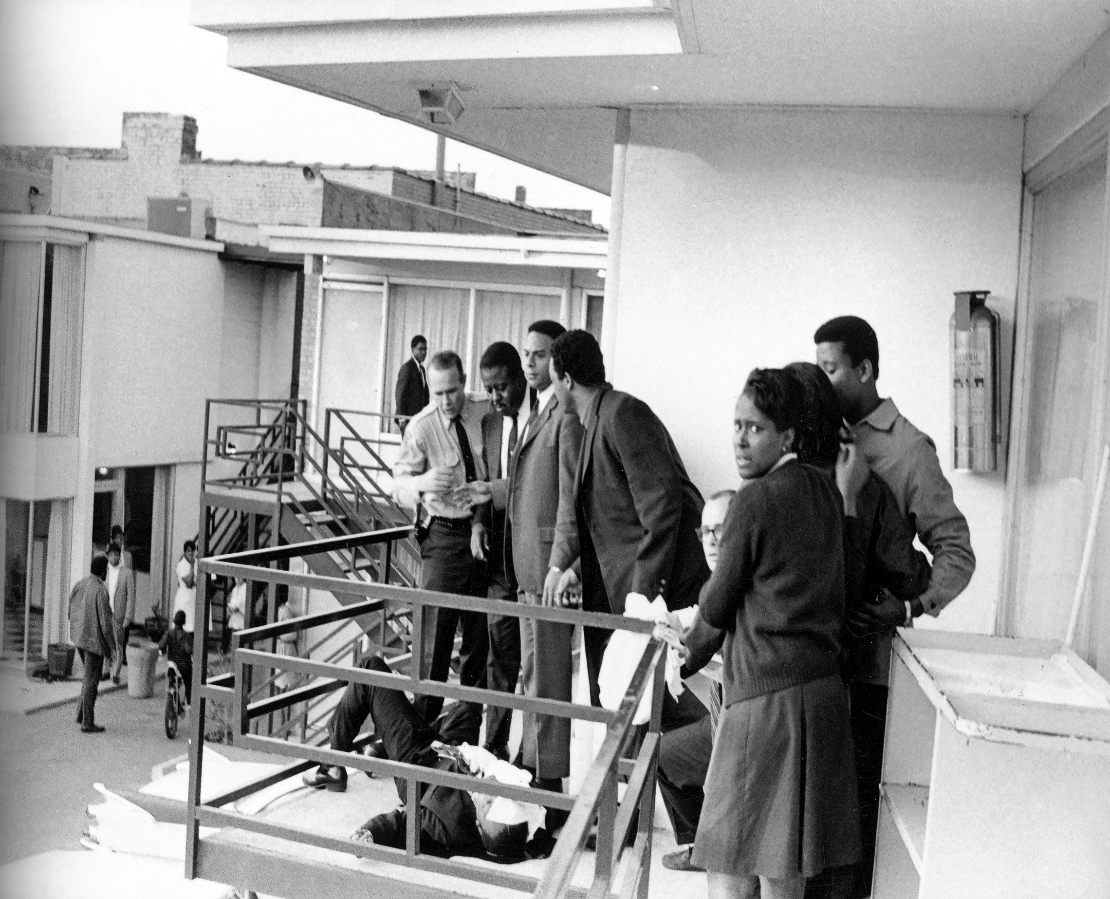 April 4, 1968: Memphis police join Ralph Abernathy, Andrew Young and Jesse Jackson on a balcony of the Lorraine Motel. Martin Luther King, Jr. lies unconscious at their feet, felled by an assassin's bullet. He never regained consciousness. (Photo by Joseph Louw/Time Life Pictures/Getty Images)